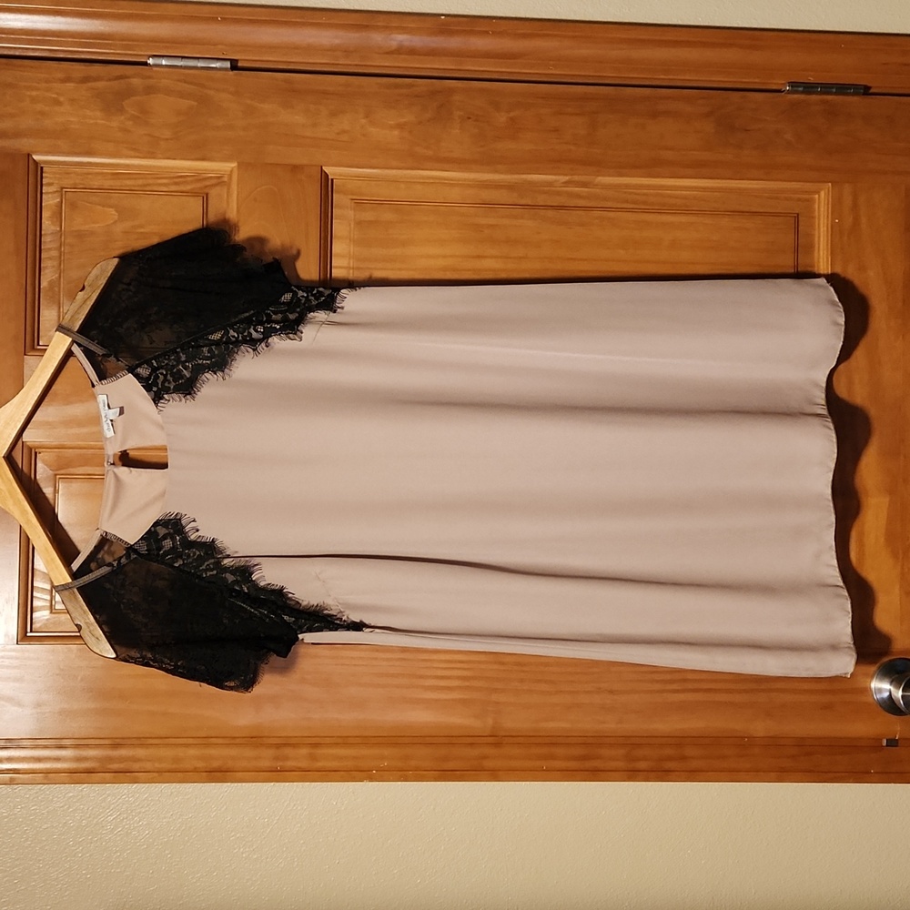Tan dress with black lace sleeves